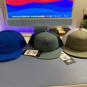 3 Arc’teryx Logo Trucker Flat